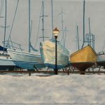 Painting of sailboats propped on stands in a snow-covered boatyard
