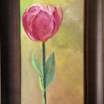 Painting of a single pink tulip on a soft gold ground in a deep wooden frame